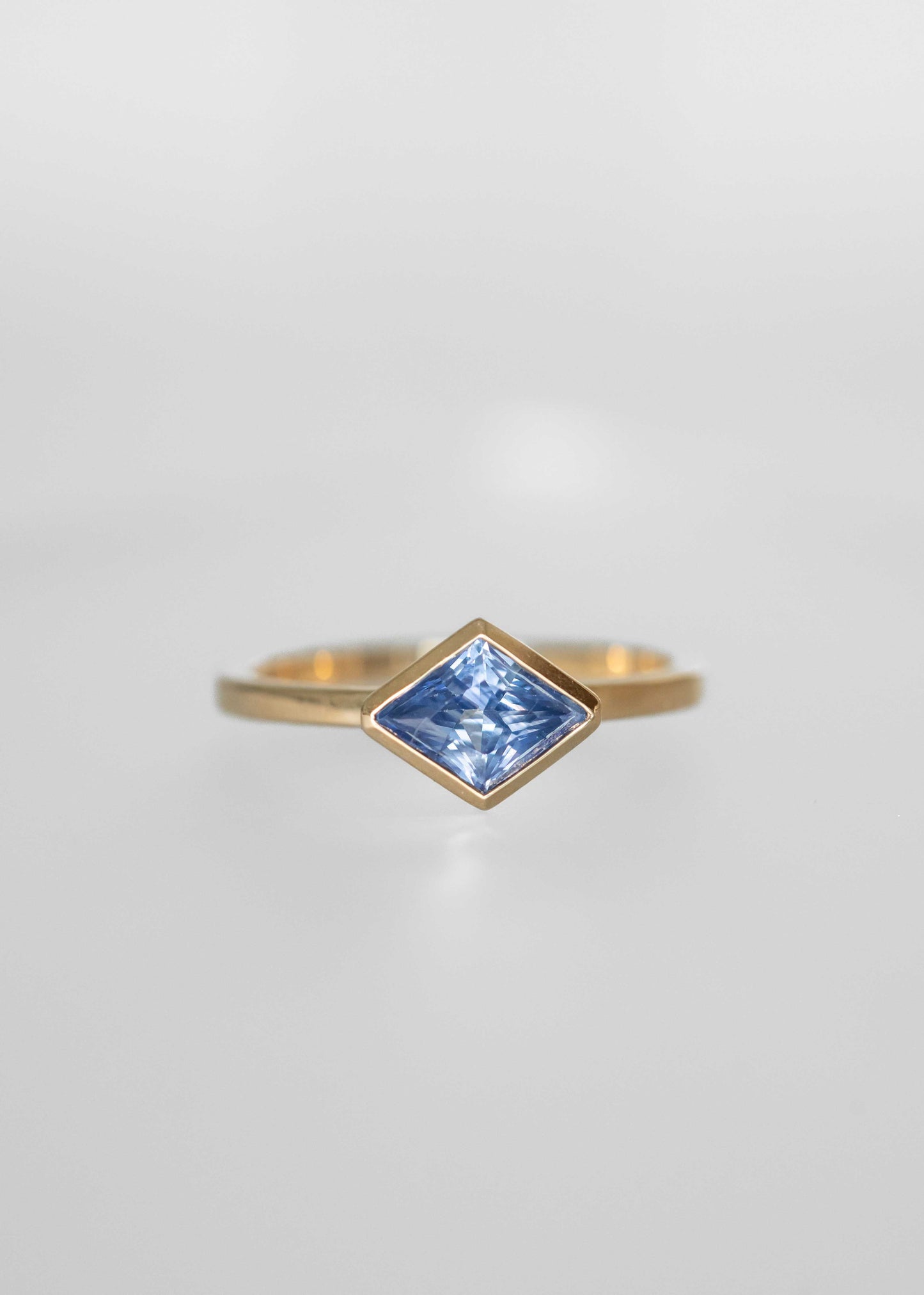 lozenge sapphire engagement ring, 14K yellow gold sapphire ring, bezel set sapphire ring, modern solitaire ring, geometric engagement ring, Leda setting, periwinkle sapphire ring, unique sapphire ring, ethical gemstone ring, minimalist engagement ring