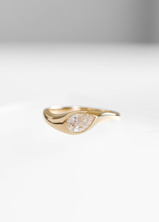 pear moissanite engagement ring, 14k yellow gold engagement ring, Apollo setting ring, sculptural engagement ring, minimalist gold ring, alternative bridal ring, modern pear ring, bezel inspired engagement ring