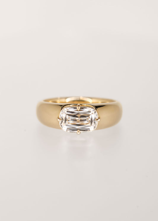 Gender neutral east west ashoka cut lab grown diamond engagement ring in 14K yellow gold with a chunky domed band and compass prongs